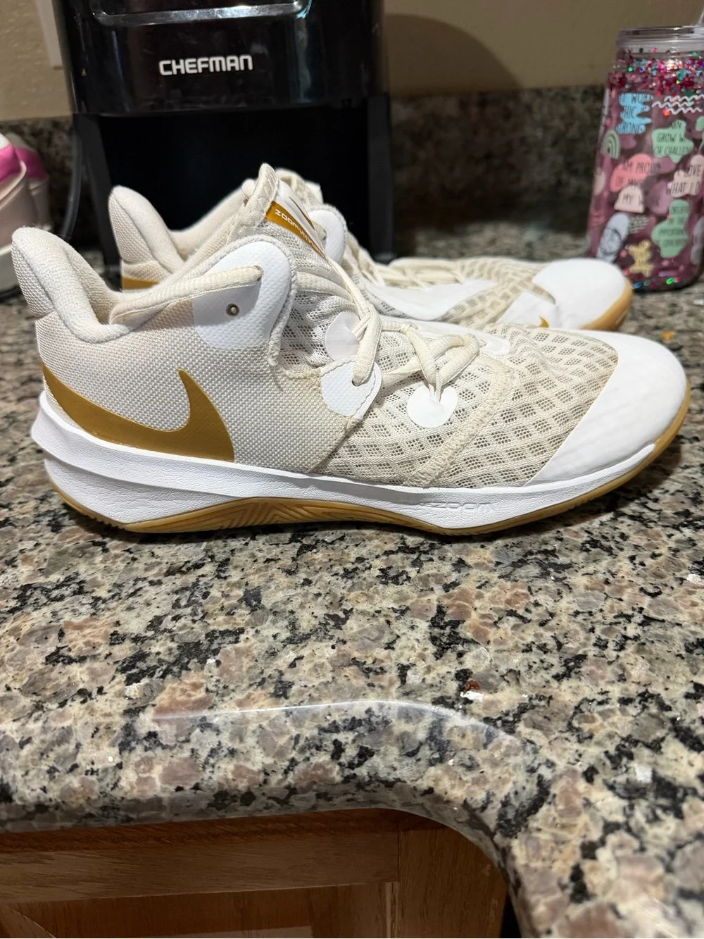 Nike Kids White Sneakers with Metallic Gold Accents
